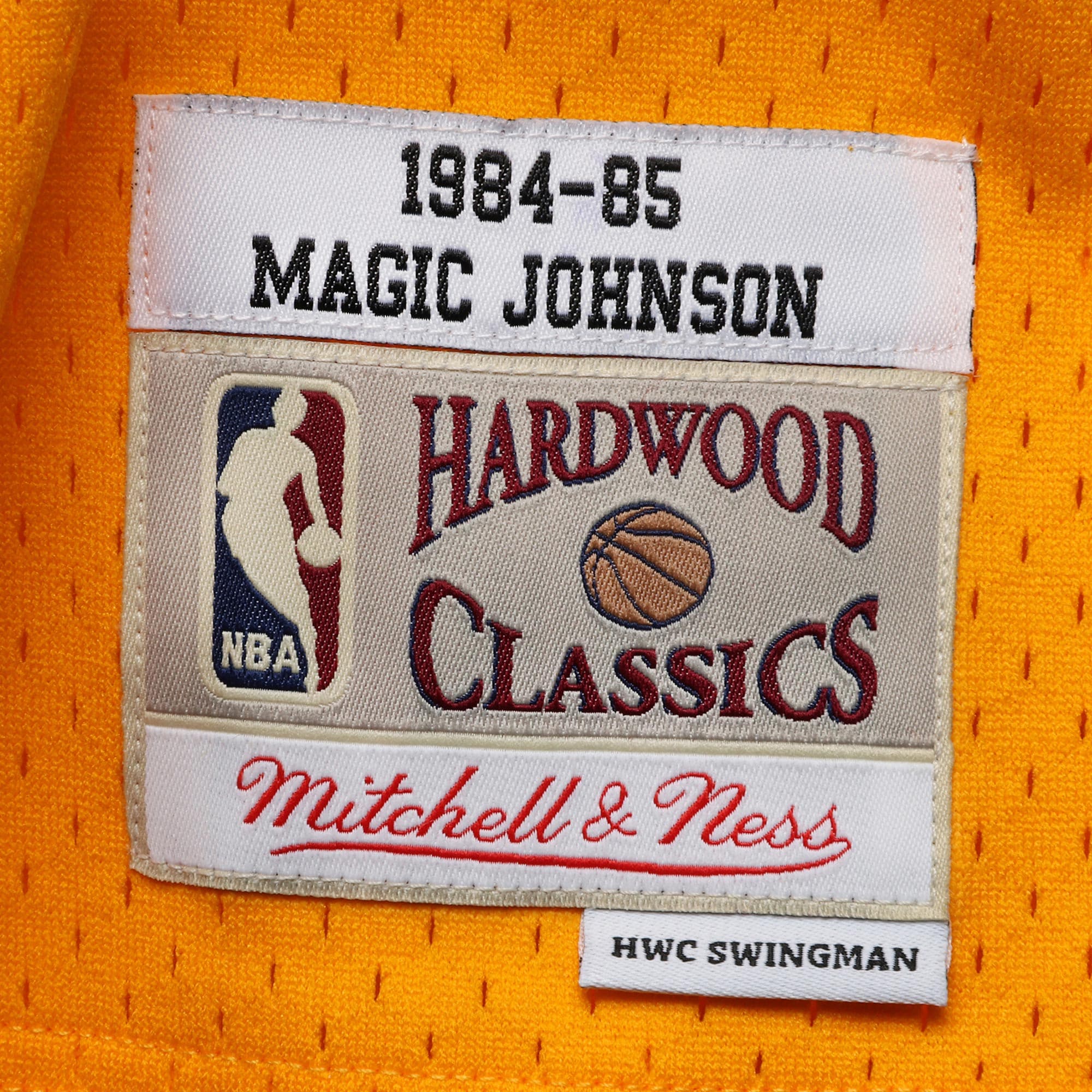 Men's Mitchell & Ness Magic Johnson Gold Los Angeles Lakers 1984-85 Hardwood Classics Swingman Jersey